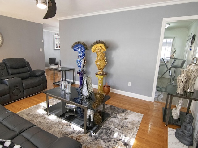 living room featuring ornamental molding and hardwood / wood-style floors