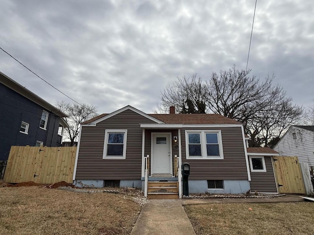 view of front of home with a front yard