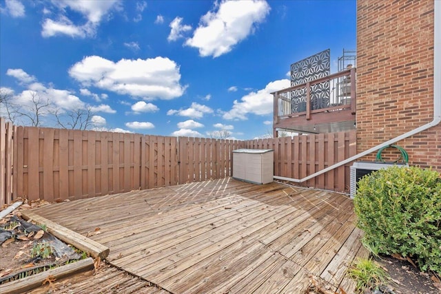 wooden terrace featuring central AC unit