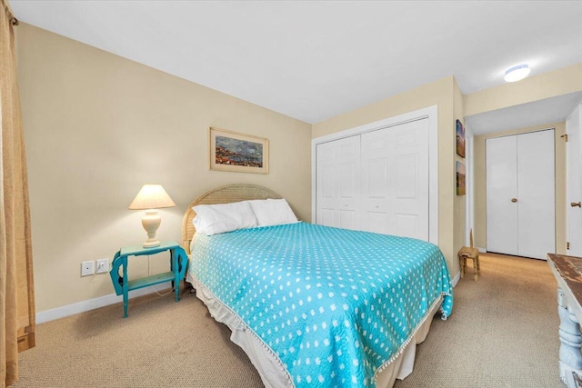 carpeted bedroom featuring a closet