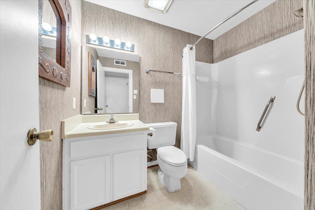 full bathroom featuring vanity, shower / bathtub combination with curtain, and toilet