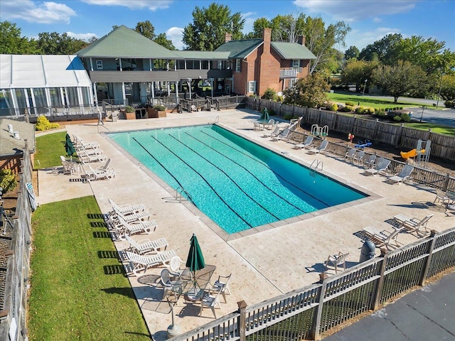 view of pool featuring a patio area