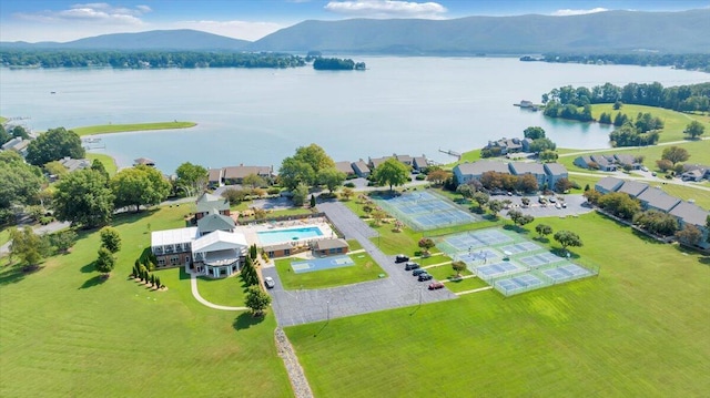 aerial view featuring a water and mountain view