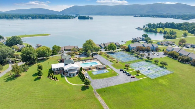 aerial view featuring a water and mountain view