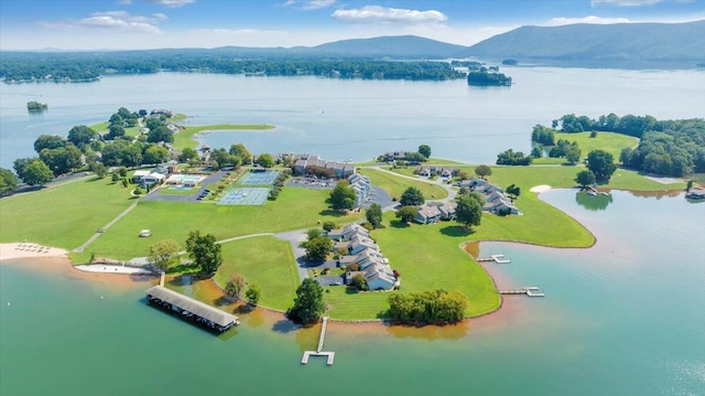 bird's eye view with a water and mountain view