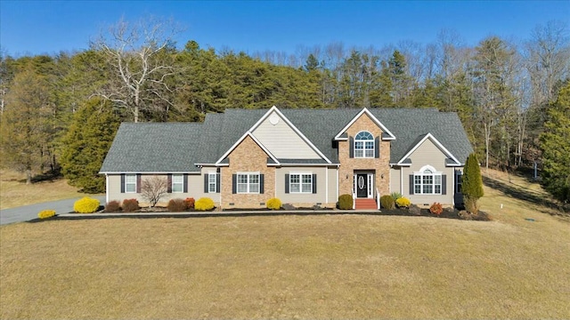 view of front of home with a front lawn