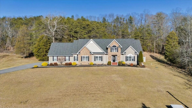 view of front of home featuring a front lawn