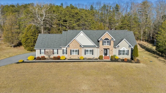 view of front of home featuring a front yard