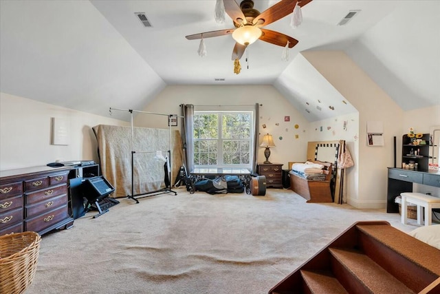 interior space featuring vaulted ceiling, light colored carpet, and ceiling fan