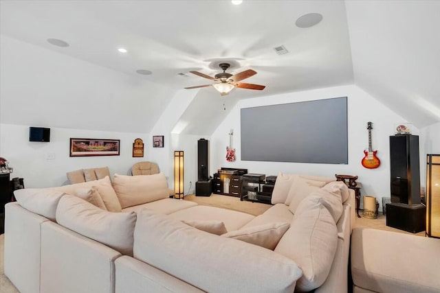 cinema room featuring ceiling fan, lofted ceiling, and light carpet