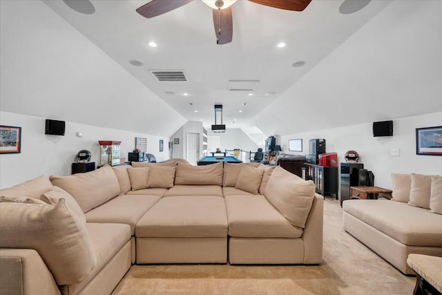 living room with ceiling fan, lofted ceiling, and light carpet