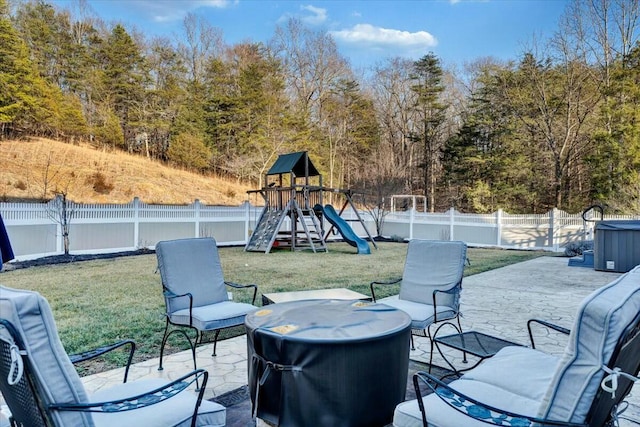 view of patio featuring a playground