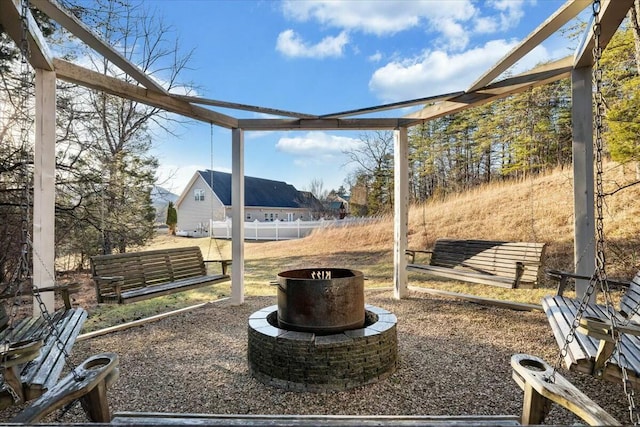 view of yard with an outdoor fire pit