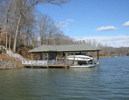 dock area featuring a water view