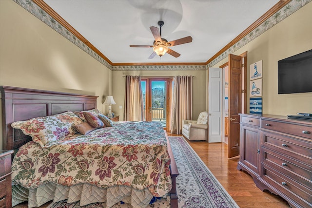 bedroom featuring access to outside, ceiling fan, ornamental molding, and wood finished floors