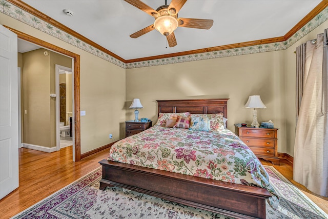 bedroom featuring crown molding, a ceiling fan, baseboards, and light wood-style flooring