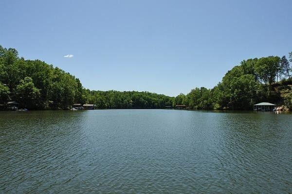 view of water feature featuring a wooded view