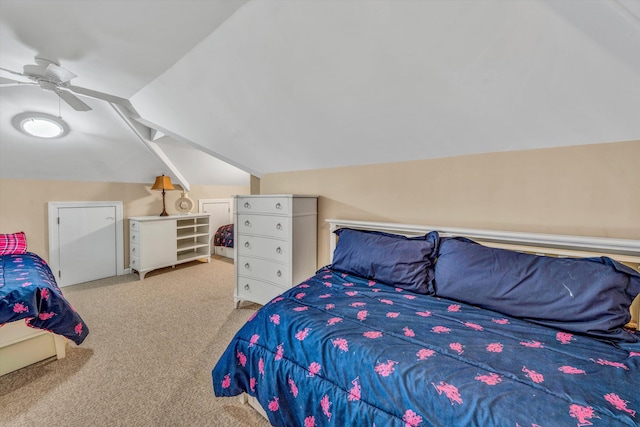 carpeted bedroom featuring a ceiling fan and lofted ceiling