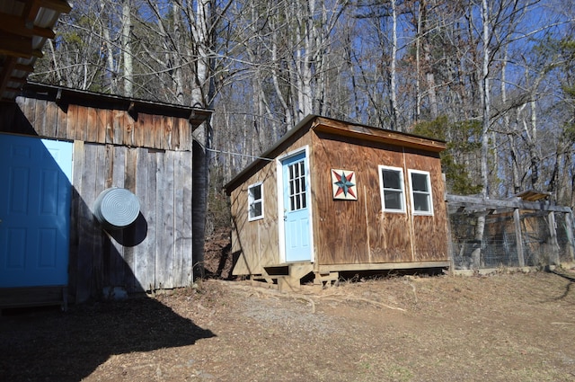 view of outbuilding featuring an outdoor structure