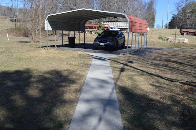 view of parking with a detached carport