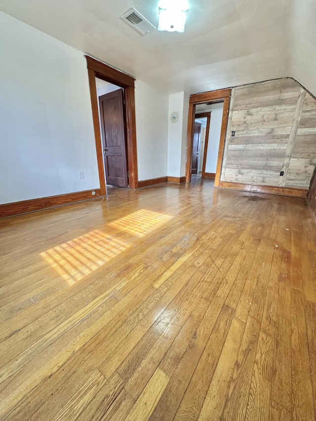 spare room with light wood-type flooring