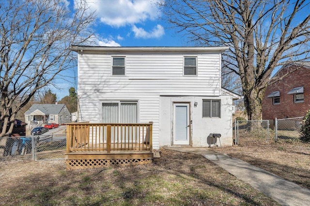 rear view of house with a deck