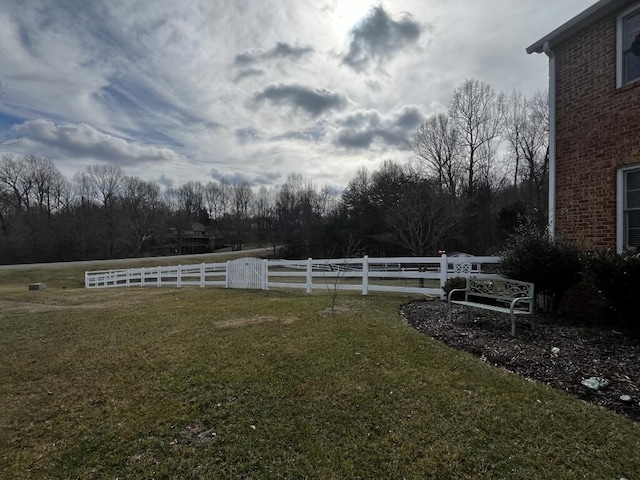 view of yard featuring fence