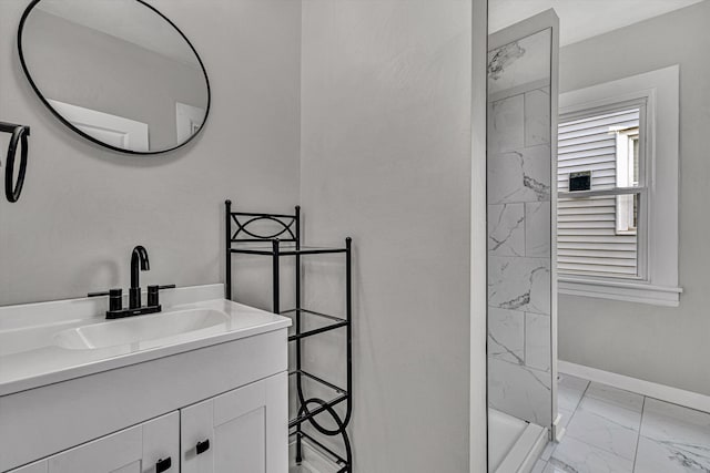 bathroom with vanity and a shower