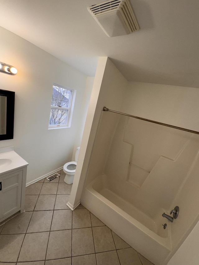 full bathroom featuring shower / tub combination, vanity, toilet, and tile patterned flooring