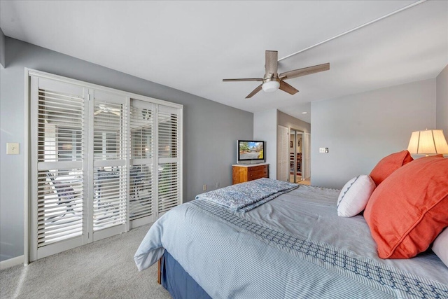 bedroom with ceiling fan, carpet flooring, and access to outside