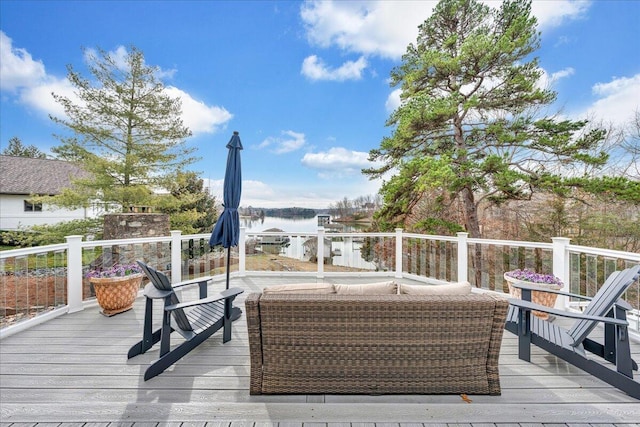 wooden terrace with a water view