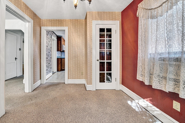 spare room with carpet flooring