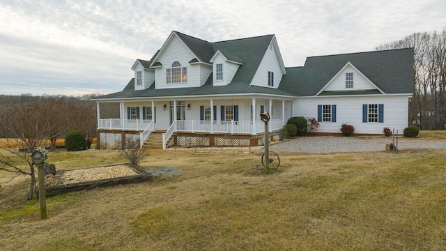 farmhouse-style home with a porch and a front yard