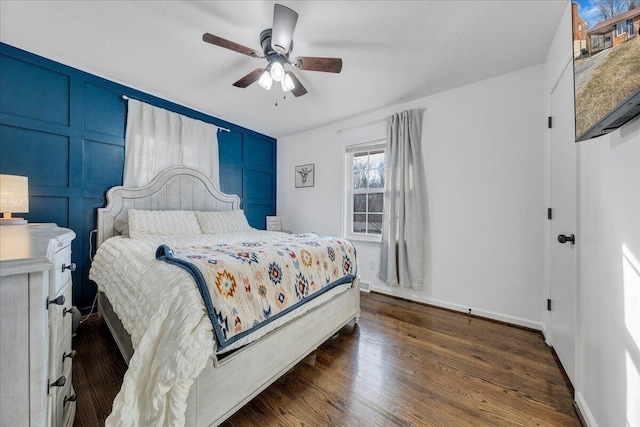 bedroom featuring dark wood-type flooring and ceiling fan