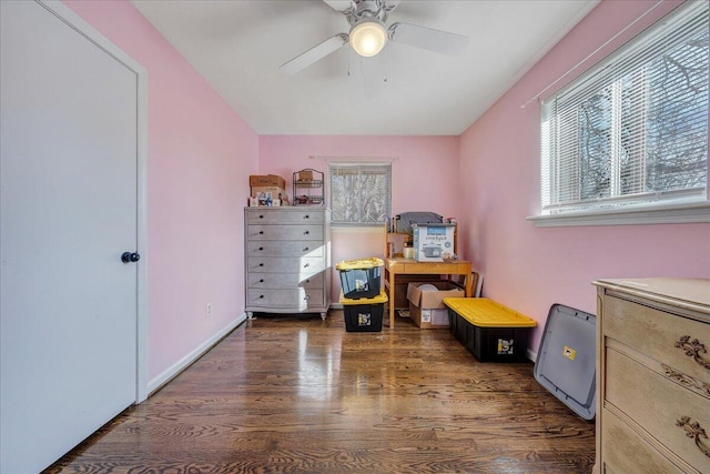 recreation room featuring plenty of natural light, dark hardwood / wood-style floors, and ceiling fan