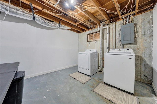 basement with separate washer and dryer and electric panel