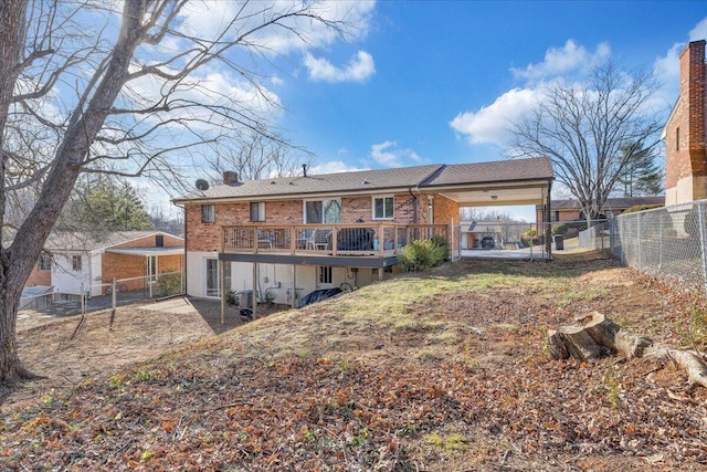 rear view of house with a deck