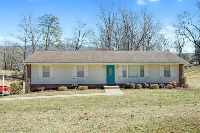 single story home featuring brick siding and a front yard