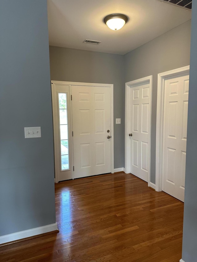 1057 Barrow Hills Dr, Huddleston, VA 24104 - foyer with baseboards and wood finished floors