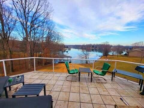 view of patio / terrace with a water view