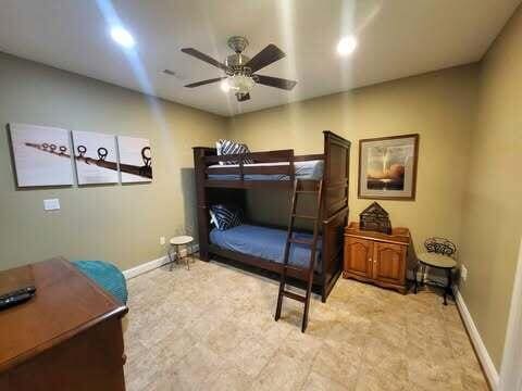 bedroom featuring ceiling fan