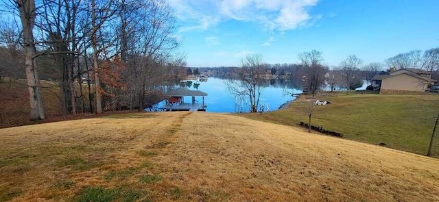 view of yard with a gazebo and a water view