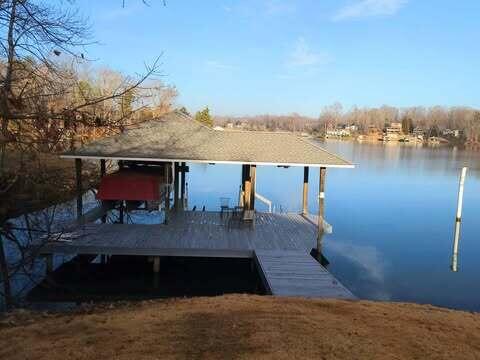 dock area with a water view