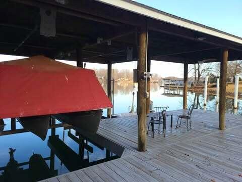 dock area with a water view