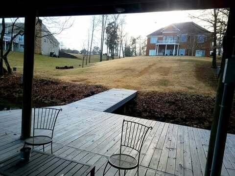 dock area featuring a yard