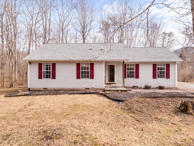 ranch-style home with a front yard