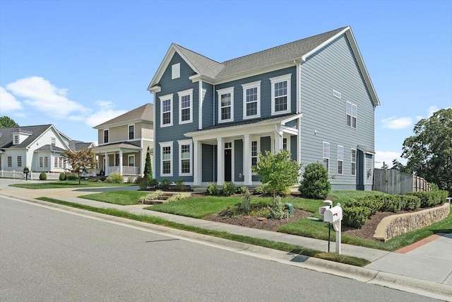 view of front of property featuring covered porch