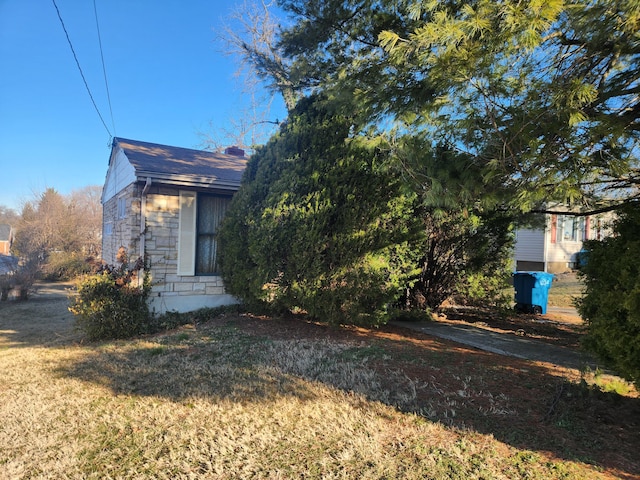 exterior space featuring a lawn