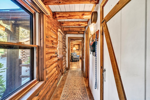 hallway featuring beamed ceiling, wooden walls, wood ceiling, and dark hardwood / wood-style flooring