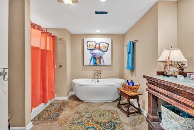bathroom featuring independent shower and bath